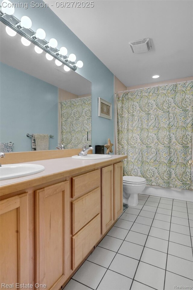 2300 Canyon Ridge Dr, White Lake, MI 48383 - bathroom featuring tile patterned flooring, double vanity, and curtained shower