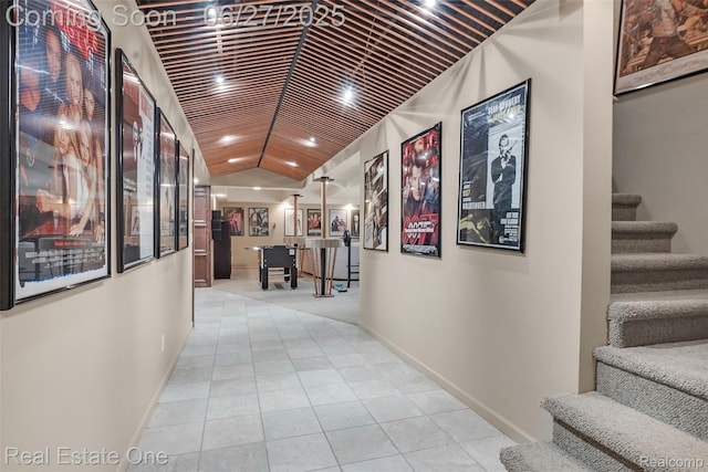 2300 Canyon Ridge Dr, White Lake, MI 48383 - hall with stairs, lofted ceiling, and tile patterned floors