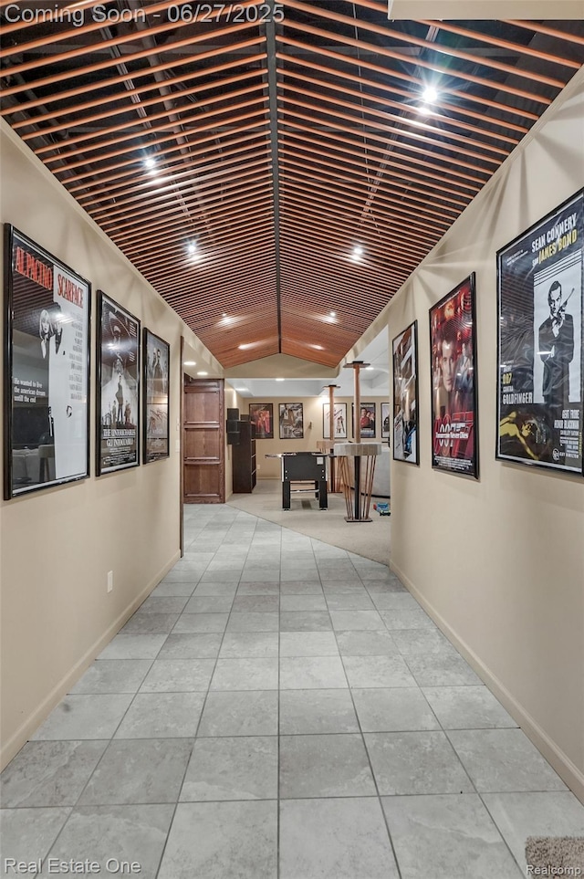 2300 Canyon Ridge Dr, White Lake, MI 48383 - hall featuring tile patterned flooring and vaulted ceiling