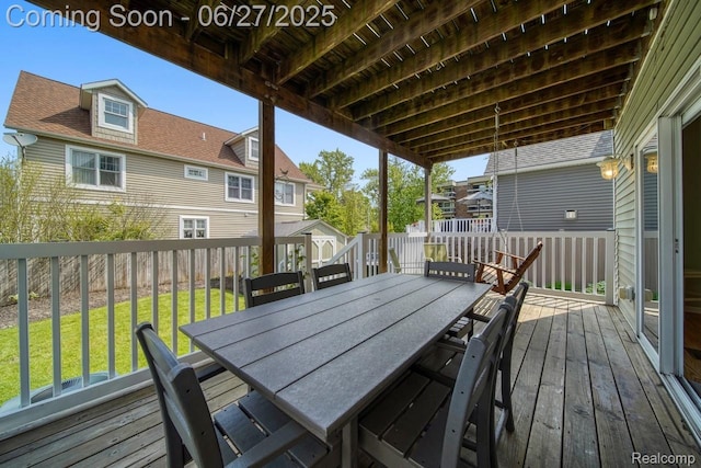 229 Huron St, South Haven, MI 49090 - deck with outdoor dining space, a residential view, and a fenced backyard