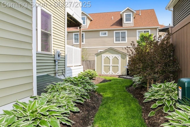 229 Huron St, South Haven, MI 49090 - view of yard featuring a storage shed
