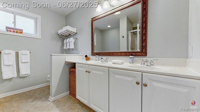 229 Huron St, South Haven, MI 49090 - full bathroom featuring double vanity, a shower with shower door, and tile patterned flooring