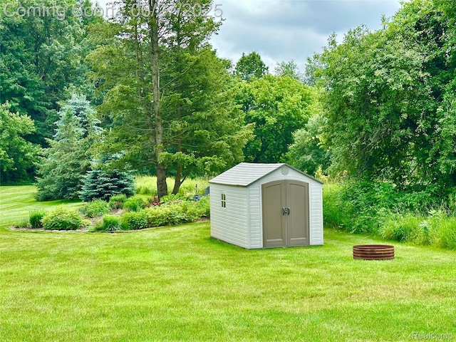 9276 Old Plank Ln, Brighton, MI 48114 - view of shed with a view of trees