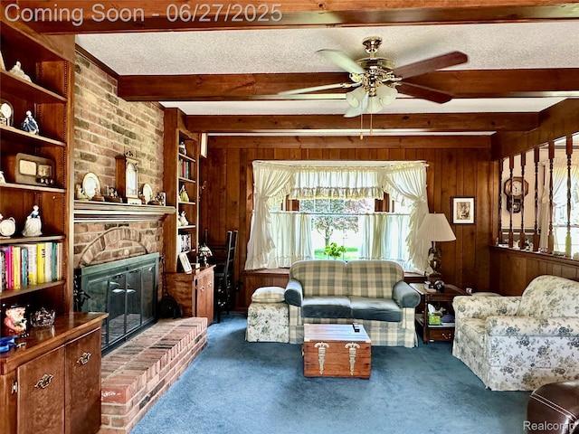 9276 Old Plank Ln, Brighton, MI 48114 - living area with wooden walls, beam ceiling, a ceiling fan, carpet flooring, and a textured ceiling