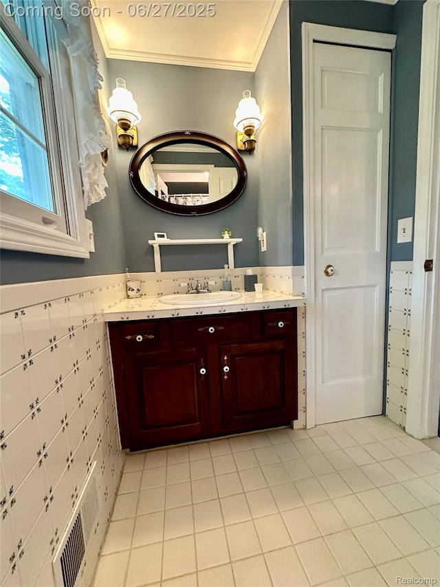 9276 Old Plank Ln, Brighton, MI 48114 - bathroom featuring crown molding, vanity, and tile patterned floors