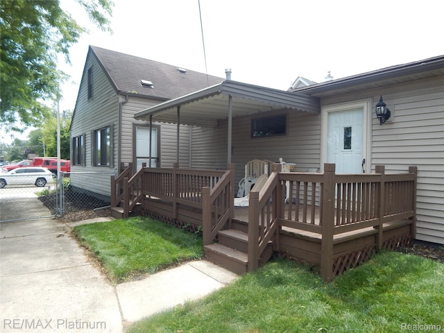 22133 Rosedale St, Saint Clair Shores, MI 48080 - rear view of house featuring a wooden deck