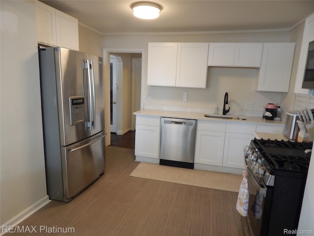 22133 Rosedale St, Saint Clair Shores, MI 48080 - kitchen with stainless steel appliances, light countertops, white cabinetry, and crown molding