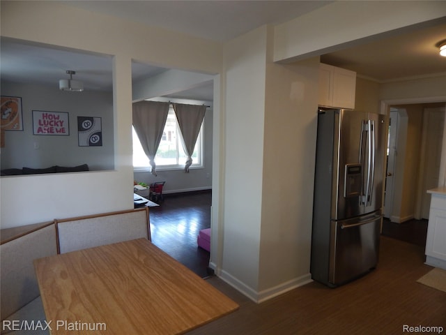 22133 Rosedale St, Saint Clair Shores, MI 48080 - kitchen featuring stainless steel fridge, dark wood finished floors, white cabinets, and light countertops