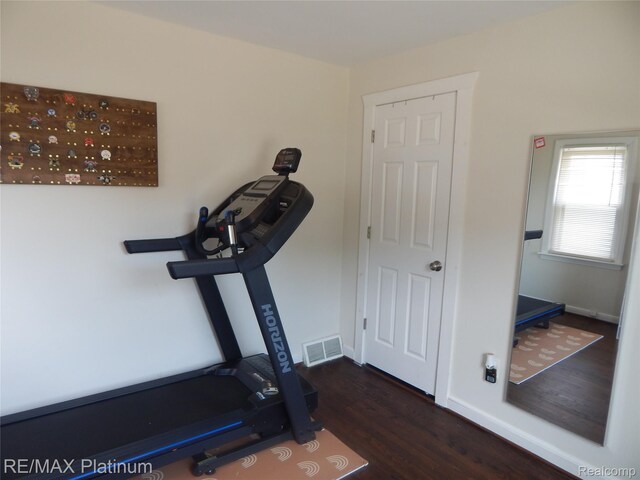 22133 Rosedale St, Saint Clair Shores, MI 48080 - workout room with dark wood-style floors
