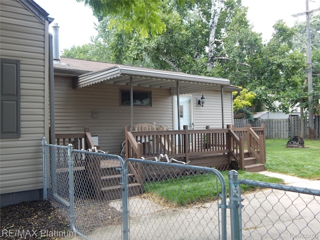 22133 Rosedale St, Saint Clair Shores, MI 48080 - back of property featuring a gate, a deck, and roof with shingles