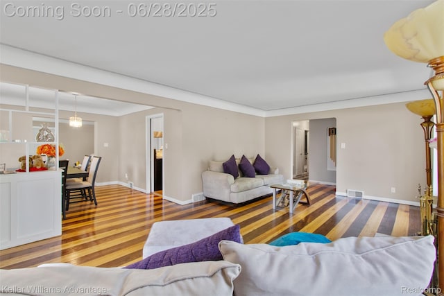 21415 Lathrup St, Southfield, MI 48075 - living area featuring wood finished floors and baseboards