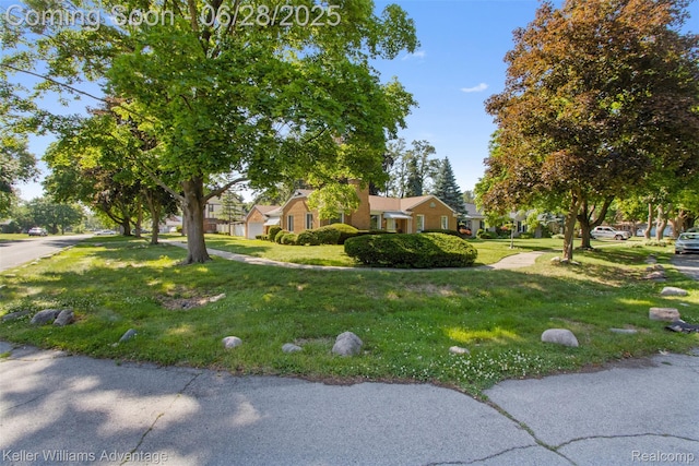 21415 Lathrup St, Southfield, MI 48075 - view of home's exterior with a lawn