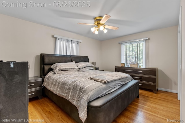 21415 Lathrup St, Southfield, MI 48075 - bedroom with light wood-type flooring and ceiling fan