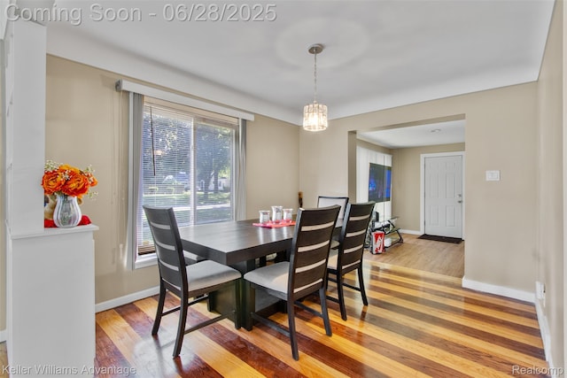 21415 Lathrup St, Southfield, MI 48075 - dining space featuring light wood-type flooring and baseboards