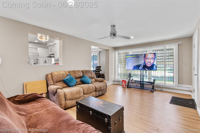 21415 Lathrup St, Southfield, MI 48075 - living area with light wood-type flooring and a ceiling fan
