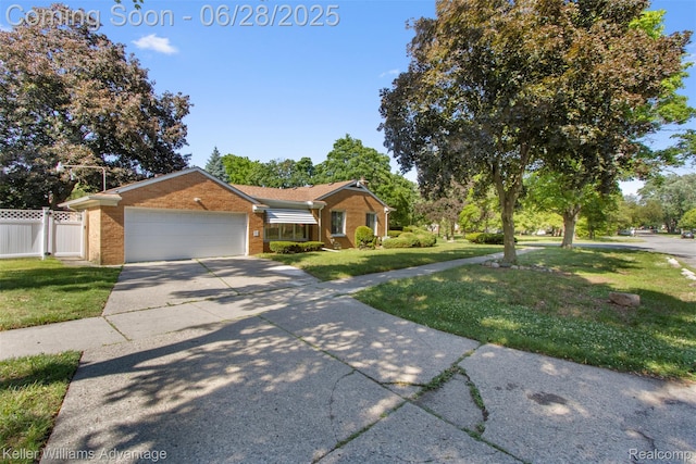 21415 Lathrup St, Southfield, MI 48075 - ranch-style home with brick siding, a garage, and concrete driveway