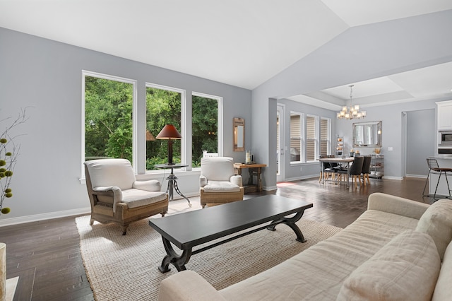 636 Wynding Oaks, Kalamazoo, MI 49006 - living room with a chandelier, dark wood-style flooring, and lofted ceiling