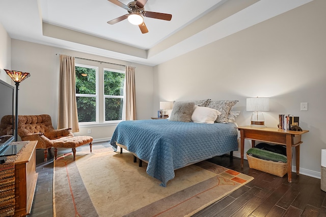 636 Wynding Oaks, Kalamazoo, MI 49006 - bedroom featuring wood finished floors, a tray ceiling, and ceiling fan