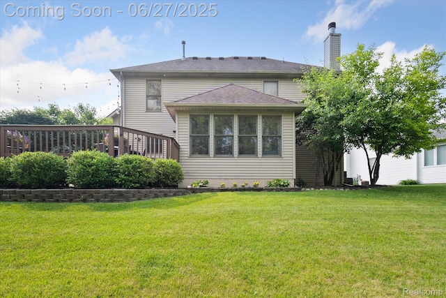 1453 Maplewood Dr, Saline, MI 48176 - rear view of house featuring a lawn and a chimney