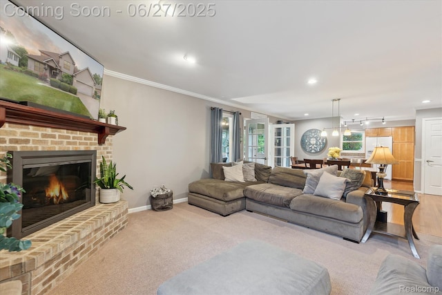 1453 Maplewood Dr, Saline, MI 48176 - living room with carpet, ornamental molding, plenty of natural light, a fireplace, and recessed lighting