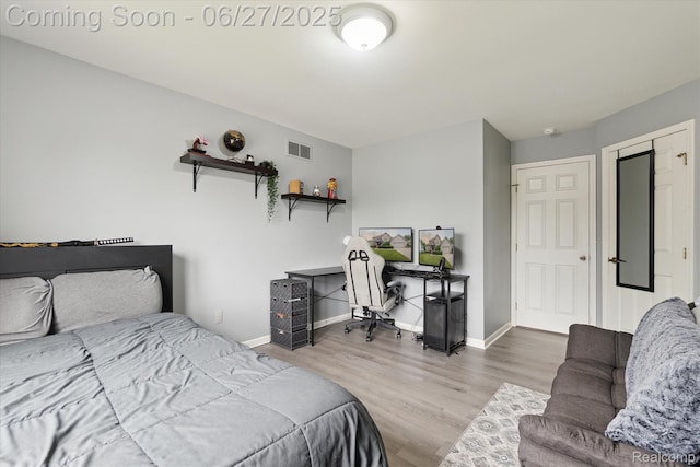 1453 Maplewood Dr, Saline, MI 48176 - bedroom featuring wood finished floors and a desk