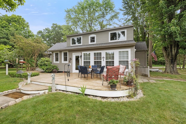 9708 Oakland Dr, Portage, MI 49024 - rear view of property with a deck, a yard, and a shingled roof