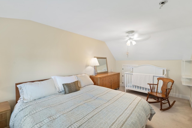 9708 Oakland Dr, Portage, MI 49024 - bedroom with lofted ceiling, light carpet, and a ceiling fan