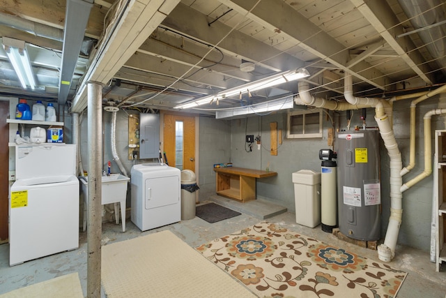 9708 Oakland Dr, Portage, MI 49024 - unfinished basement with water heater, electric panel, separate washer and dryer, and a water softener