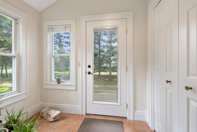 9708 Oakland Dr, Portage, MI 49024 - doorway to outside with tile patterned floors and lofted ceiling
