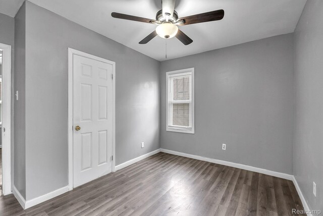 15852 Washburn St, Dearborn, MI 48238 - unfurnished room featuring ceiling fan and wood finished floors
