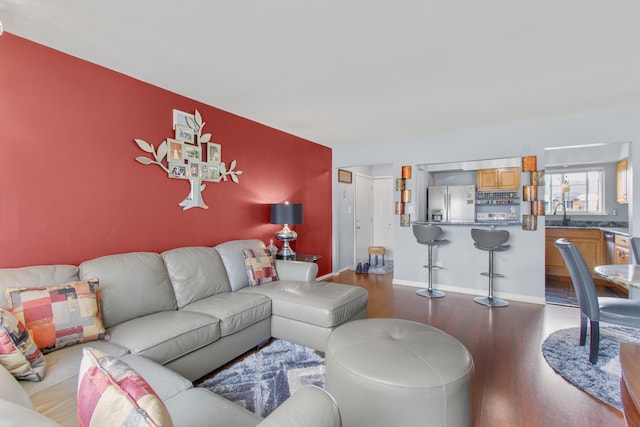 25349 Shiawassee Cir Unit 204, Southfield, MI 48033 - living room with wood finished floors and baseboards