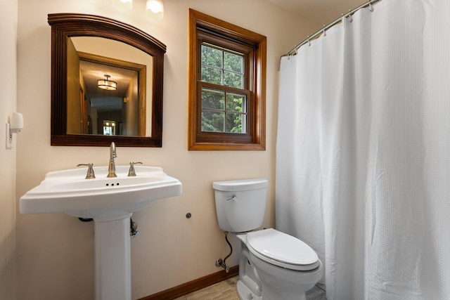 3395 Simsbury Dr, Pinckney, MI 48169 - full bath with wood finished floors and curtained shower