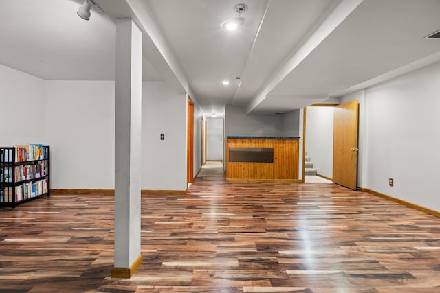 3395 Simsbury Dr, Pinckney, MI 48169 - finished below grade area featuring wood finished floors, recessed lighting, and stairway