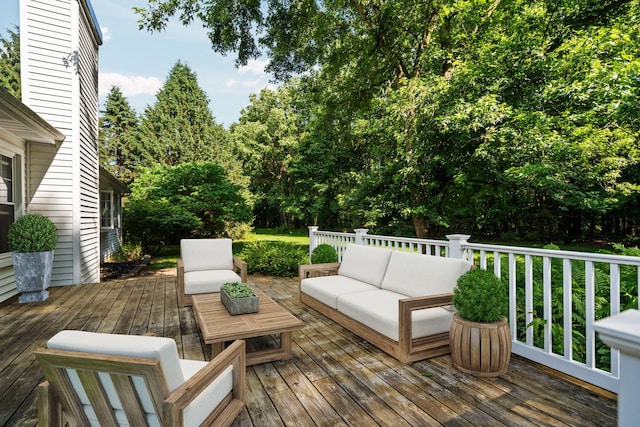 3395 Simsbury Dr, Pinckney, MI 48169 - wooden deck with an outdoor hangout area