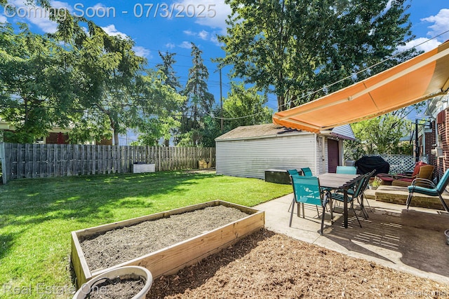 29038 Spoon Ave, Madison Heights, MI 48071 - fenced backyard featuring a vegetable garden, a patio area, and an outdoor structure
