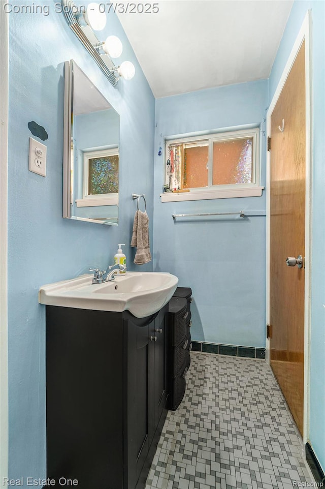 29038 Spoon Ave, Madison Heights, MI 48071 - bathroom with vanity, plenty of natural light, and tile patterned floors