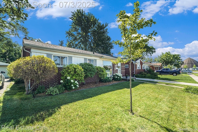 29038 Spoon Ave, Madison Heights, MI 48071 - ranch-style home with brick siding and a front lawn
