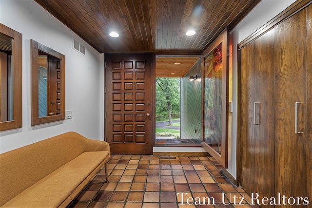 410 Greentree Ln NE, Ada, MI 49301 - foyer entrance featuring wooden ceiling and recessed lighting