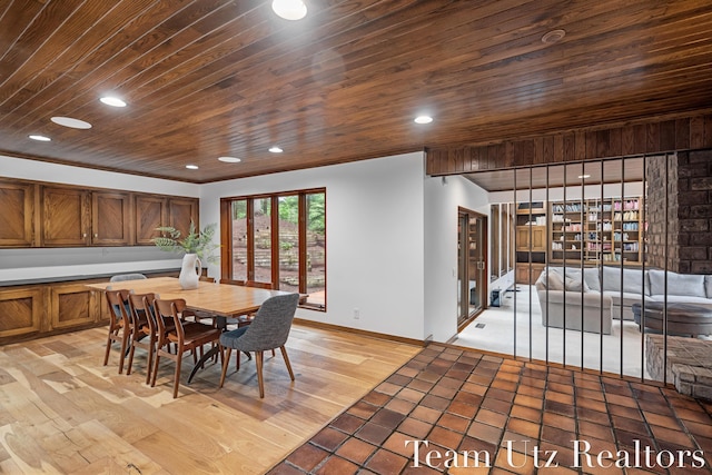 410 Greentree Ln NE, Ada, MI 49301 - dining area with wooden ceiling, recessed lighting, and light wood-style flooring