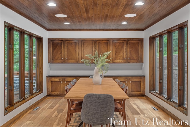 410 Greentree Ln NE, Ada, MI 49301 - dining room featuring wooden ceiling, light wood-style flooring, and recessed lighting