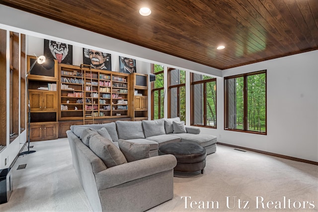 410 Greentree Ln NE, Ada, MI 49301 - carpeted living area featuring wooden ceiling and recessed lighting