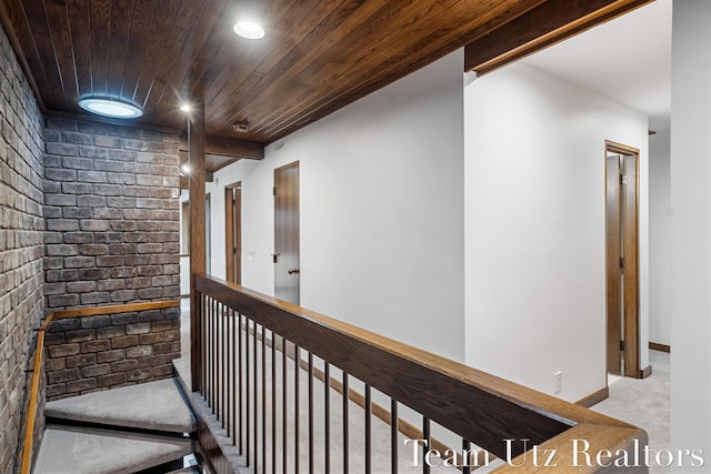 410 Greentree Ln NE, Ada, MI 49301 - hallway with a wooden ceiling with exposed beams, recessed lighting, and carpet flooring