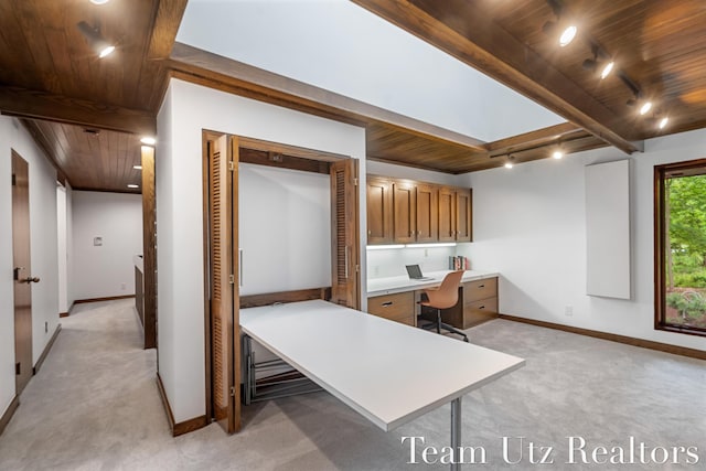 410 Greentree Ln NE, Ada, MI 49301 - home office with a wooden ceiling with exposed beams, built in study area, and light carpet