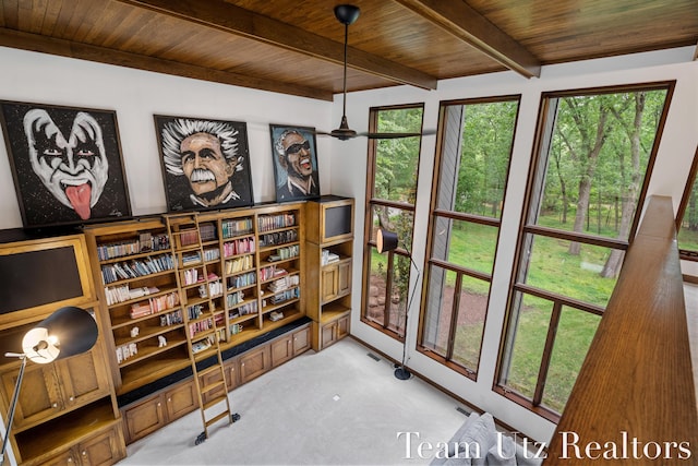 410 Greentree Ln NE, Ada, MI 49301 - sitting room featuring a wooden ceiling with exposed beams, carpet flooring, and healthy amount of natural light