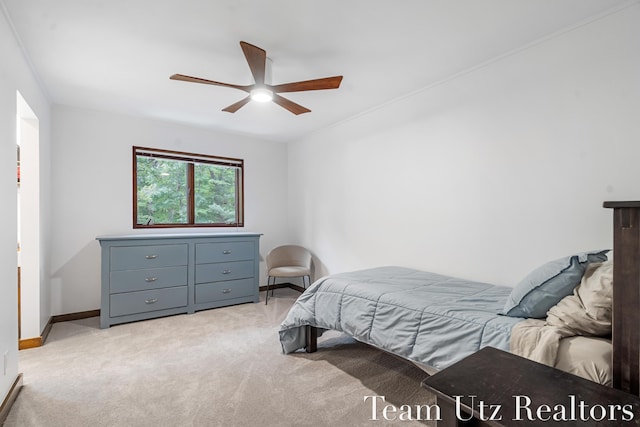 410 Greentree Ln NE, Ada, MI 49301 - bedroom featuring light carpet and a ceiling fan
