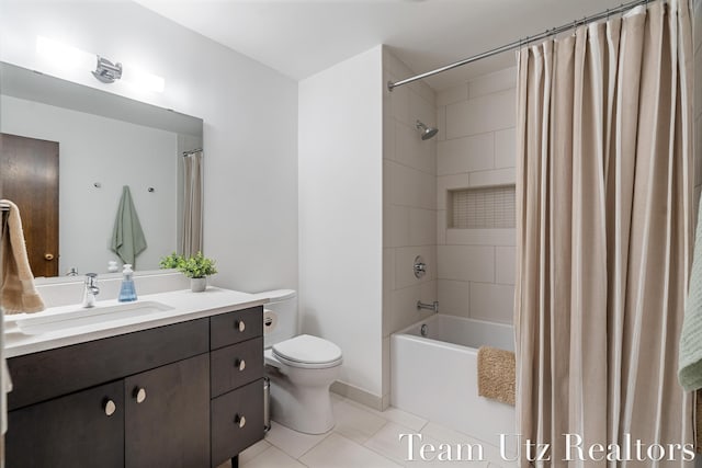 410 Greentree Ln NE, Ada, MI 49301 - full bathroom with vanity, tile patterned floors, and shower / bath combo with shower curtain