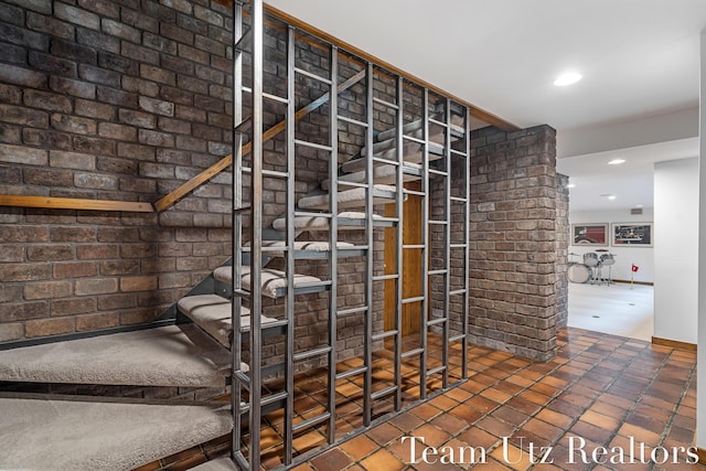 410 Greentree Ln NE, Ada, MI 49301 - staircase featuring recessed lighting