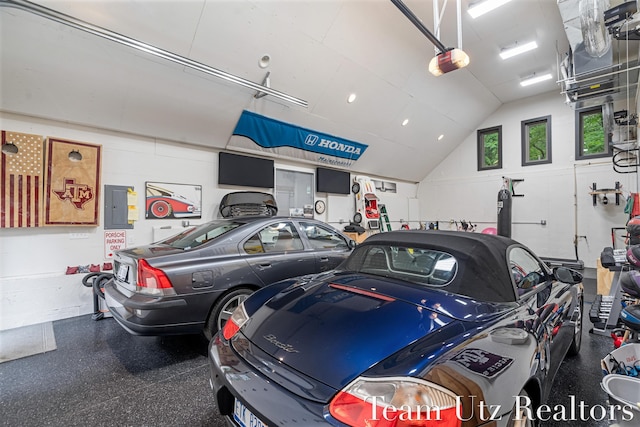 410 Greentree Ln NE, Ada, MI 49301 - garage with a garage door opener and electric panel