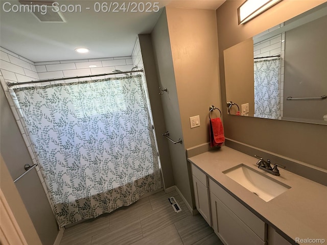 53240 Odilon Ave, Shelby Twp, MI 48316 - bathroom featuring vanity, a shower with curtain, and recessed lighting