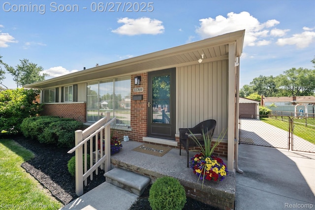11769 Eileen, Redford, MI 48239 - property entrance featuring brick siding and a gate